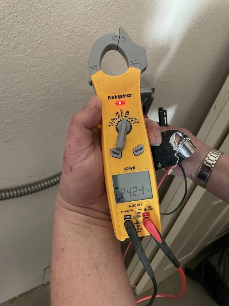 Voltage testing with clamp meter during Generator Installation in Westminster